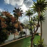 House With A Tropical Garden Hébergement de vacances