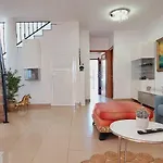 House With A Tropical Garden