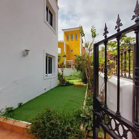 House With A Tropical Garden