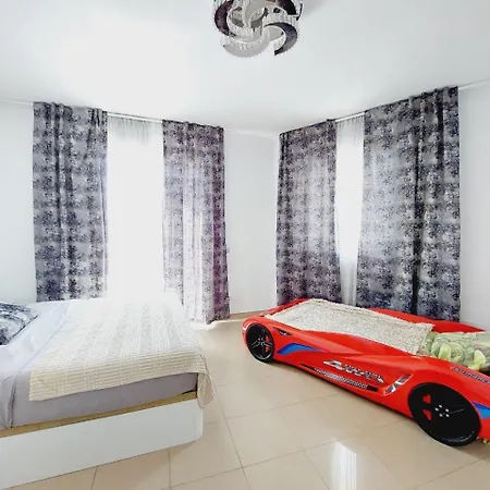 House With A Tropical Garden Адехе