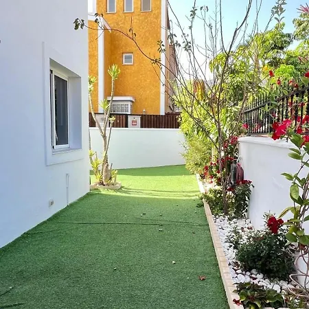 House With A Tropical Garden