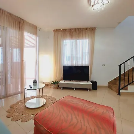 House With A Tropical Garden